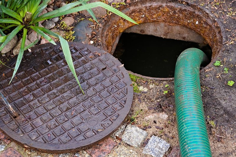 Septic manhole with pipe